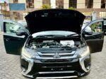 Mitsubishi Outlander PHEV, plug-in hybrid SUV Kenya, import Mitsubishi Outlander PHEV Japan, 2.4L MIVEC hybrid engine, twin electric motor SUV, Super All-Wheel Control S-AWC, electric-only range SUV, fuel-efficient hybrid Kenya, CHAdeMO fast charging, regenerative braking paddles, spacious 5-seater family SUV, panoramic sunroof crossover, leather interior package, advanced safety features, adaptive cruise control, 360-degree camera system, power tailgate SUV, best hybrid SUV Nairobi, second-hand cars Mombasa port, buy Mitsubishi Outlander online Kenya, car import agency Mombasa Road, Japanese auction grade cars, Nairobi car yards, Mombasa Road motor dealers, Ngong Road car showroom, Kiambu Road auto outlets, Thika Road car sales, Nakuru car importers, Eldoret vehicle sales, Kisumu car dealers, Mombasa car imports, Nyeri motor vehicles, Meru car buyers, Malindi vehicle imports, Diani coastal cars, financing for cars Kenya, bank asset finance vehicles, comprehensive car insurance Kenya, spare parts Kirinyaga Road, genuine Mitsubishi parts Nairobi, trusted car dealers Kenya, GN0W chassis Outlander PHEV, GG3W model upgrade Kenya, 13.8 kWh lithium-ion battery, home charging 3-pin plug Kenya, Type 1 to Type 2 adapter cable, public EV charging stations Nairobi, KRA import duty hybrid cars, NTSA motor vehicle registration, asset financing bank loans, comprehensive motor cover Kenya, direct import from Japan, low mileage plug-in hybrid, Black Edition Outlander PHEV, G-Package trim, P-Package luxury trim, S-Edition Bilstein shocks, 190mm ground clearance Kenya, rough road suspension tuning, urban family crossover Kenya, silent electric drive mode, daily commute fuel savings, zero emission city driving, dual-zone climate control, Apple CarPlay Android Auto, smartphone link display audio, heated front seats, power adjustable driver seat, LED headlights and fog lamps, alloy wheels upgrade, roof rails utility, rear spoiler design, multi-information display cluster, electronic parking brake, hill descent control, active stability control ASC, blind spot warning, rear cross traffic alert, forward collision mitigation, lane departure warning, ISOFIX child seat anchors, smart keyless entry, push-to-start ignition, power folding side mirrors, rain-sensing wipers, automatic high beam, premium Rockford Fosgate sound system, USB charging ports rear, 12V auxiliary battery maintenance, hybrid system diagnostic scan, specialized EV mechanics Nairobi, coolant flush service, brake pad replacement, Michelin and Bridgestone tyres, Chloride Exide battery dealers, roadside assistance Kenya, AA rescue coverage, port clearance logistics, container freight station delivery, bond warehouse release, logbook transfer process, TIMS account verification, annual motor inspection, resale value hybrid cars, eco-friendly driving Kenya, road trip ready SUV, upcountry driving comfort, weekend getaway vehicle, spacious boot capacity, fold-flat rear seats, durable roof racks, premium floor mats, door visors, mud flaps, body protection film, ceramic coating detailing, professional car wash Nairobi, engine bay steam cleaning, interior vacuuming, leather seat conditioning, steering wheel wrap, window tinting legal limits, dash camera installation, vehicle tracking security, anti-theft immobilizer, comprehensive extended warranty, trade-in options Nairobi, certified pre-owned inspection, motor mart alternatives, bazaar car sales events, online auto listing platform, top-rated family car Kenya, executive commuter crossover