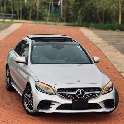 Mercedes Benz C200, Mercedes C200 Kenya, Luxury Sedan Nairobi, Used Mercedes C200 Price, Import Mercedes Benz Kenya, German Cars Nairobi, Executive Sedan Kenya, Mercedes C200 AMG Line, Mercedes C200 BlueEFFICIENCY, BMW 3 Series Alternative, Audi A4 Competitor, Best Luxury Cars Kenya, Mombasa Road Car Dealers, Jamhuri Motors Nairobi, Left Hand Drive Mercedes, Right Hand Drive C200, Auto Selection Kenya, Car Import Agents Nairobi, KRA Vehicle Import Duty, Japanese Import Mercedes C200, UK Import Mercedes Kenya, Certified Pre-Owned Cars Nairobi, Affordable Luxury Sedans, Fuel Efficient Luxury Cars, Hybrid Mercedes C200, 9G-Tronic Transmission, MBUX Infotainment System, Artico Leather Interior, Ambient Lighting Sedan, Panoramic Sunroof Mercedes, Keyless Go Mercedes C200, LED Intelligent Light System, Parking Package 360 Camera, Collision Prevention Assist, Attention Assist Mercedes, Sport Suspension Sedan, Alloy Wheels Mercedes C200, Rear-Wheel Drive Sedan, 4MATIC Mercedes Kenya, Turbocharged Luxury Car, 1.5L Hybrid C200, 2.0L Turbo Sedan, Car Financing Kenya, Asset Finance Mercedes Benz, Bank Financing Car Kenya, Comprehensive Car Insurance Kenya, Logbook Transfer Nairobi, NTSA Vehicle Registration, Car Spare Parts Nairobi, Mercedes Specialist Mechanics Kenya, German Auto Garage Nairobi, Car Maintenance Kenya, Second Hand Cars Jiji Kenya, Pigiame Cars Mercedes, Autochek Kenya C200, Cheki Kenya Mercedes Benz, Car Dealerships Westlands, Lavington Car Sale, Karen Luxury Cars, Kilimani Auto Dealers, Mombasa Car Imports, Kisumu Used Cars, Nakuru Car Dealerships, Eldoret Vehicle Sales, Thika Road Car Yards, Industrial Area Mechanics Nairobi, Car Detailing Nairobi, Ceramic Coating Cars Kenya, Window Tinting Legal Kenya, Executive Car Rental Nairobi, Wedding Cars Mercedes Kenya, VIP Transport Nairobi, Corporate Fleet Vehicles, Executive Chauffeur Services, Trade-In Cars Kenya, Upgrade Your Car Nairobi, Car Inspection Services AA Kenya, Pre-Purchase Car Inspection, Best Family Sedans Kenya, Daily Driver Luxury Car, Reliable German Cars, High Resale Value Cars Kenya, Classic Mercedes C200, Modern Luxury Sedan, Smart Driving Assist, Adaptive Cruise Control Car, Lane Keeping Assist Sedan, Blind Spot Monitor Car, Heated Front Seats Mercedes, Memory Seats Driver Package, Dual-Zone Climate Control, Burmester Sound System Option, Apple CarPlay Android Auto Car, Wireless Phone Charging Sedan, Automatic Tailgate Mercedes, Rain Sensing Wipers, Tyre Pressure Monitoring, Electronic Stability Control, Anti-Lock Braking System, Isofix Child Seat Mounts, Curtain Airbags Sedan, Side Impact Protection, Crash Test Safety Rating, Fuel Economy Luxury Sedan, Eco Start Stop Function, Comfort Suspension Setup, Sport Plus Driving Mode, Paddle Shifters Mercedes, Multi-Function Steering Wheel, Digital Cockpit Display, Touchscreen Infotainment Car, Bluetooth Handsfree Sedan, USB-C Ports Car, Ambient Air Package, Cabin Air Filtration, Premium Floor Mats Mercedes, Door Sill Illumination, Chrome Exterior Trim, Privacy Glass Windows, Run-Flat Tyres Kenya, Spare Wheel Kit, First Aid Kit Mercedes, Warning Triangle Car, Owner's Manual Digital, Service History Logbook, Genuine Mercedes Parts, Performance Tuning Kenya, ECU Remap Mercedes C200, Exhaust Upgrade Sedan, Body Kit Installation, Custom Alloy Rims, Brake Pad Replacement Kenya, Rotor Resurfacing Nairobi, Transmission Fluid Change, Coolant Flush Service, Spark Plug Replacement, Air Filter Change, Oil Filter Genuine, Synthetic Engine Oil Kenya, Professional Car Wash Nairobi, Interior Vacuum Detailing, Leather Conditioning Treatment, Paint Protection Film, Rust Proofing Cars Kenya, Windshield Repair Nairobi, Dent Removal Services, Insurance Claim Garage, Roadside Assistance Kenya, Towing Services Nairobi, 24/7 Car Recovery, Happy Motoring Kenya