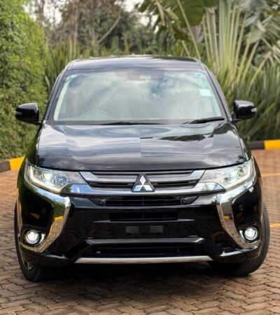Mitsubishi Outlander PHEV, plug-in hybrid SUV Kenya, import Mitsubishi Outlander PHEV Japan, 2.4L MIVEC hybrid engine, twin electric motor SUV, Super All-Wheel Control S-AWC, electric-only range SUV, fuel-efficient hybrid Kenya, CHAdeMO fast charging, regenerative braking paddles, spacious 5-seater family SUV, panoramic sunroof crossover, leather interior package, advanced safety features, adaptive cruise control, 360-degree camera system, power tailgate SUV, best hybrid SUV Nairobi, second-hand cars Mombasa port, buy Mitsubishi Outlander online Kenya, car import agency Mombasa Road, Japanese auction grade cars, Nairobi car yards, Mombasa Road motor dealers, Ngong Road car showroom, Kiambu Road auto outlets, Thika Road car sales, Nakuru car importers, Eldoret vehicle sales, Kisumu car dealers, Mombasa car imports, Nyeri motor vehicles, Meru car buyers, Malindi vehicle imports, Diani coastal cars, financing for cars Kenya, bank asset finance vehicles, comprehensive car insurance Kenya, spare parts Kirinyaga Road, genuine Mitsubishi parts Nairobi, trusted car dealers Kenya, GN0W chassis Outlander PHEV, GG3W model upgrade Kenya, 13.8 kWh lithium-ion battery, home charging 3-pin plug Kenya, Type 1 to Type 2 adapter cable, public EV charging stations Nairobi, KRA import duty hybrid cars, NTSA motor vehicle registration, asset financing bank loans, comprehensive motor cover Kenya, direct import from Japan, low mileage plug-in hybrid, Black Edition Outlander PHEV, G-Package trim, P-Package luxury trim, S-Edition Bilstein shocks, 190mm ground clearance Kenya, rough road suspension tuning, urban family crossover Kenya, silent electric drive mode, daily commute fuel savings, zero emission city driving, dual-zone climate control, Apple CarPlay Android Auto, smartphone link display audio, heated front seats, power adjustable driver seat, LED headlights and fog lamps, alloy wheels upgrade, roof rails utility, rear spoiler design, multi-information display cluster, electronic parking brake, hill descent control, active stability control ASC, blind spot warning, rear cross traffic alert, forward collision mitigation, lane departure warning, ISOFIX child seat anchors, smart keyless entry, push-to-start ignition, power folding side mirrors, rain-sensing wipers, automatic high beam, premium Rockford Fosgate sound system, USB charging ports rear, 12V auxiliary battery maintenance, hybrid system diagnostic scan, specialized EV mechanics Nairobi, coolant flush service, brake pad replacement, Michelin and Bridgestone tyres, Chloride Exide battery dealers, roadside assistance Kenya, AA rescue coverage, port clearance logistics, container freight station delivery, bond warehouse release, logbook transfer process, TIMS account verification, annual motor inspection, resale value hybrid cars, eco-friendly driving Kenya, road trip ready SUV, upcountry driving comfort, weekend getaway vehicle, spacious boot capacity, fold-flat rear seats, durable roof racks, premium floor mats, door visors, mud flaps, body protection film, ceramic coating detailing, professional car wash Nairobi, engine bay steam cleaning, interior vacuuming, leather seat conditioning, steering wheel wrap, window tinting legal limits, dash camera installation, vehicle tracking security, anti-theft immobilizer, comprehensive extended warranty, trade-in options Nairobi, certified pre-owned inspection, motor mart alternatives, bazaar car sales events, online auto listing platform, top-rated family car Kenya, executive commuter crossover